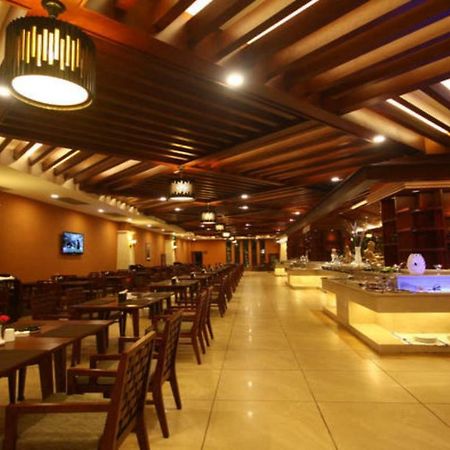 Готель Ramada Plaza Xishuangbanna Екстер'єр фото