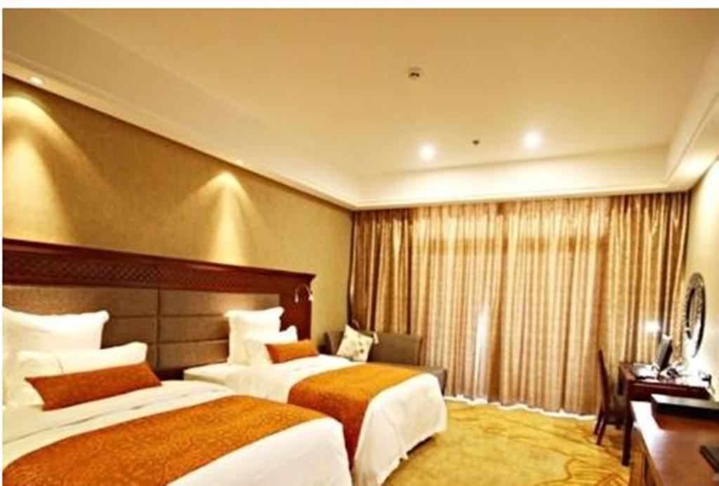 Готель Ramada Plaza Xishuangbanna Екстер'єр фото