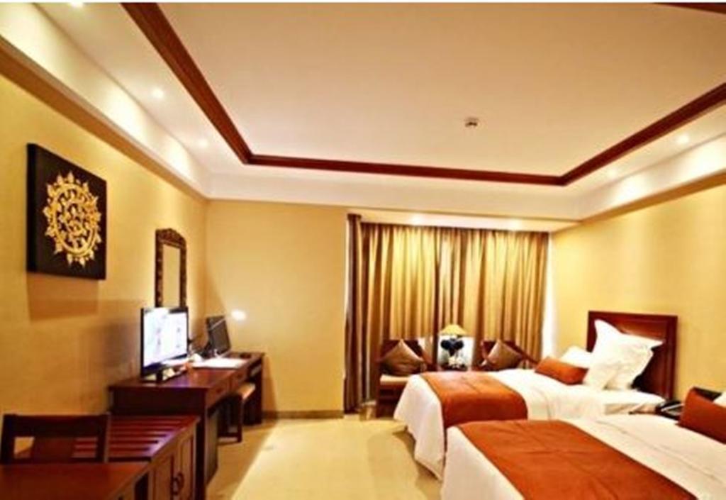 Готель Ramada Plaza Xishuangbanna Екстер'єр фото