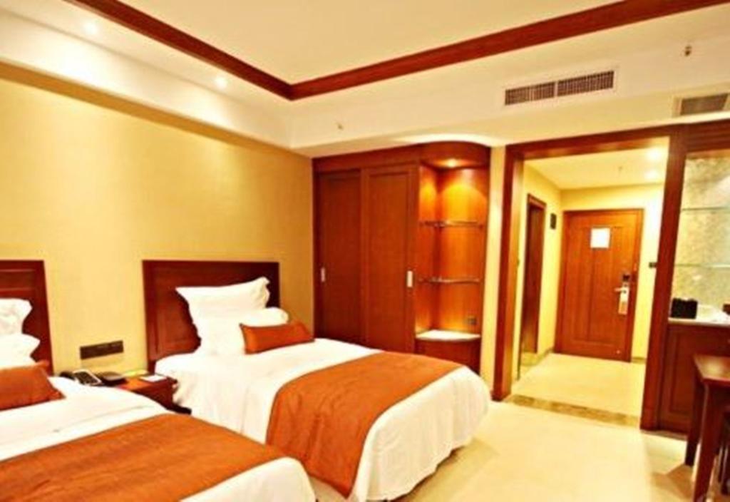 Готель Ramada Plaza Xishuangbanna Екстер'єр фото