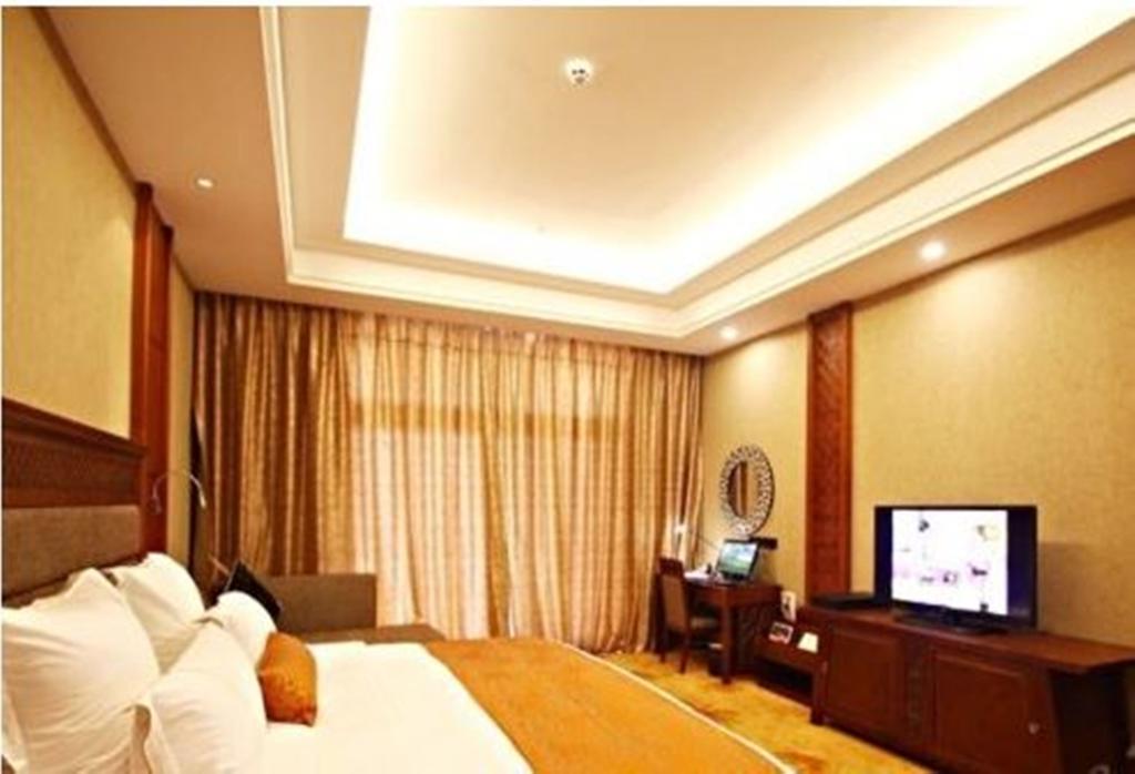 Готель Ramada Plaza Xishuangbanna Екстер'єр фото