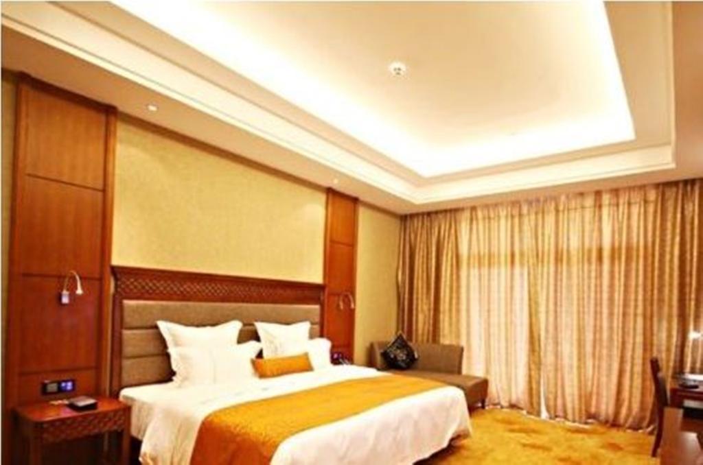 Готель Ramada Plaza Xishuangbanna Екстер'єр фото