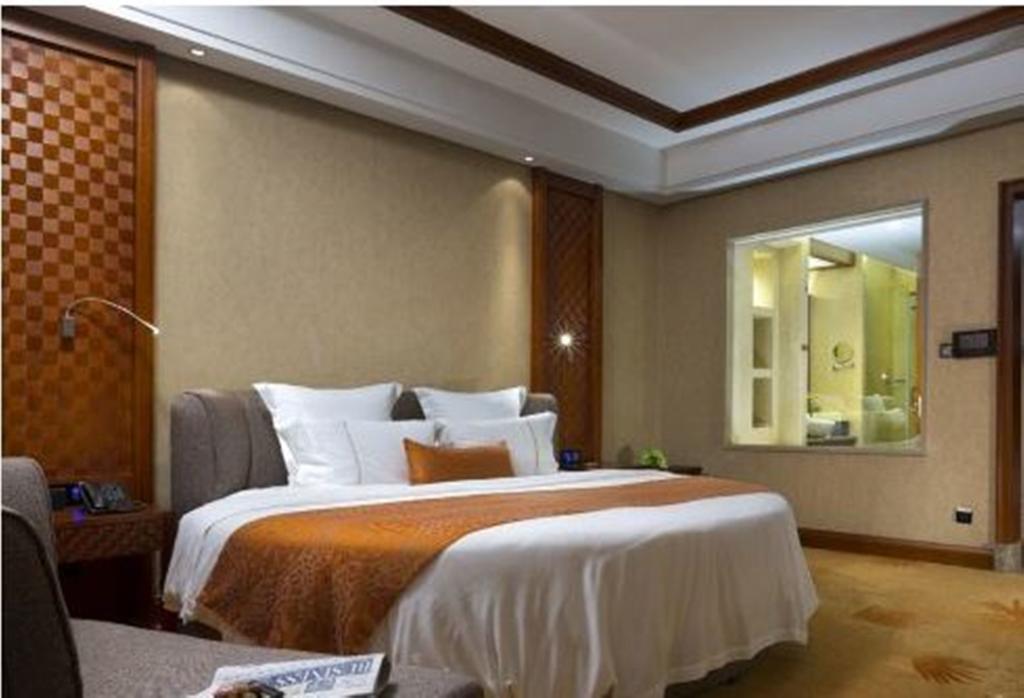 Готель Ramada Plaza Xishuangbanna Екстер'єр фото