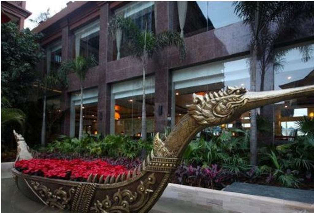 Готель Ramada Plaza Xishuangbanna Екстер'єр фото