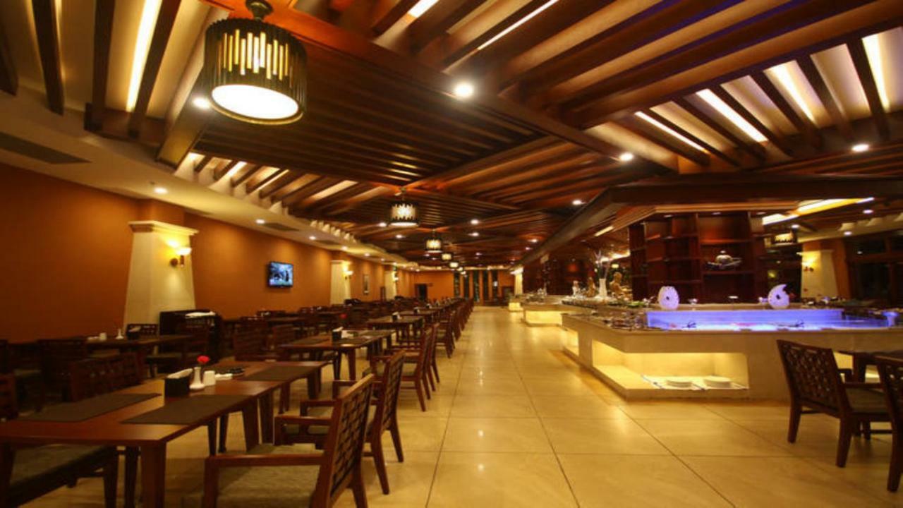 Готель Ramada Plaza Xishuangbanna Екстер'єр фото